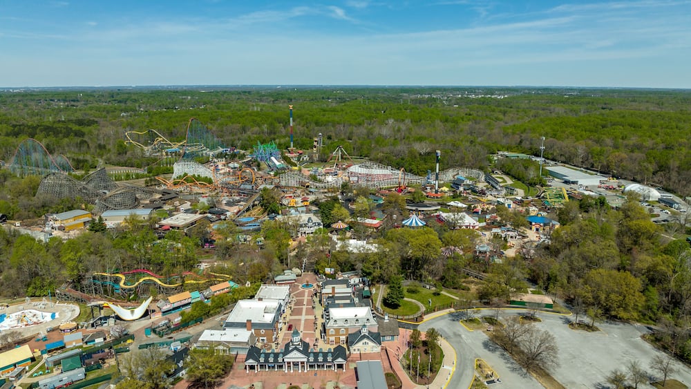 Aerial view of American amusement park with empty rides, roller coasters during the pandemic