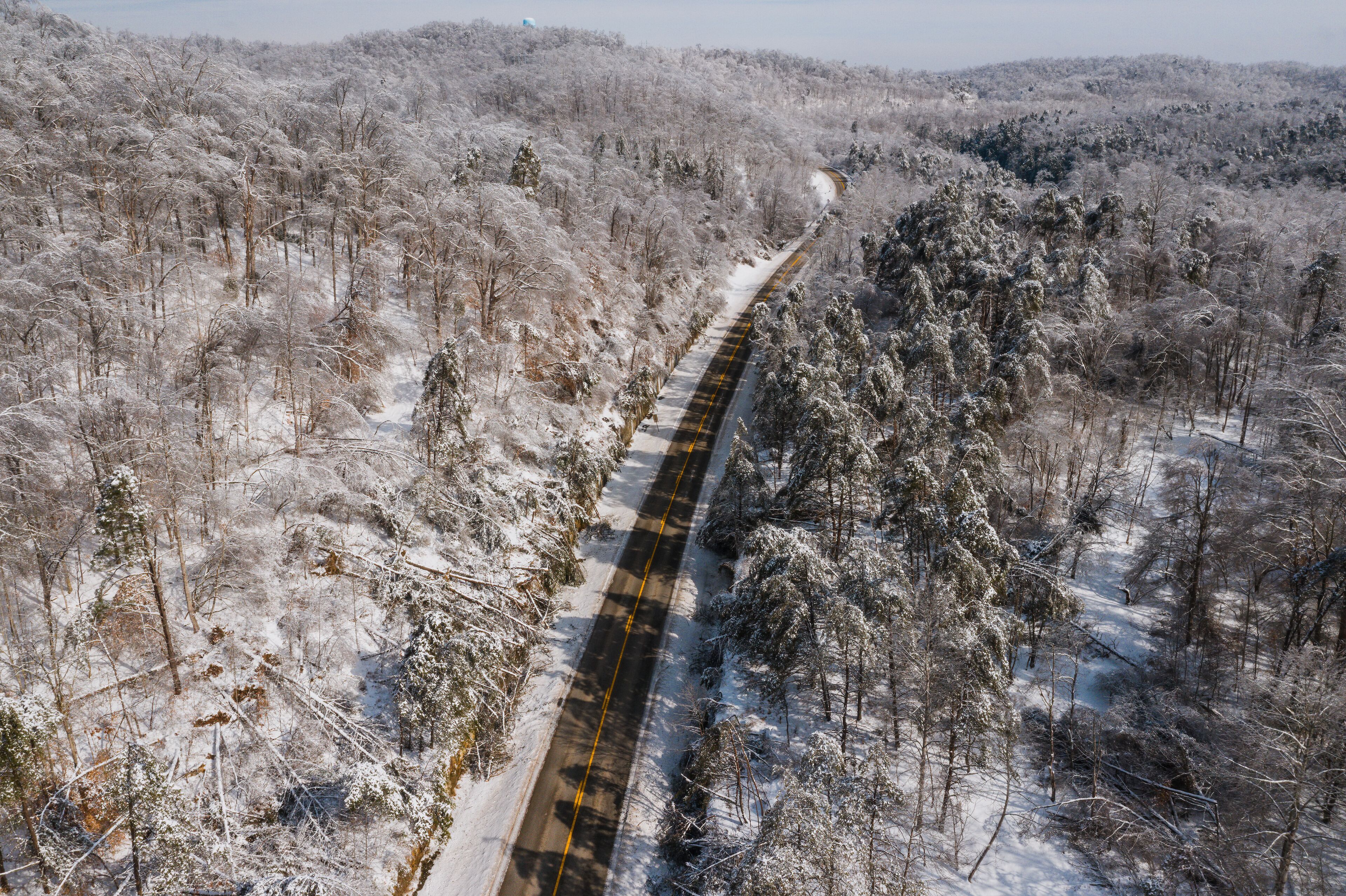 Aerial of KY Route 7 Surrounded by Snow Covered Forests - Grayson Lake State Park - Appalachian Mountains of Eastern Kentucky