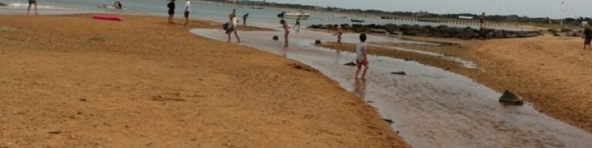 Great gentle beach to come to with little kids.  Bring nets to catch guppies and crabs.