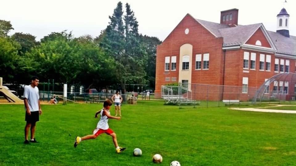 Terrific soccer field, baseball diamond, hoops court, and jungle gym at this under-used summer resource. Sundays in the summer there is organized pick up kids baseball.