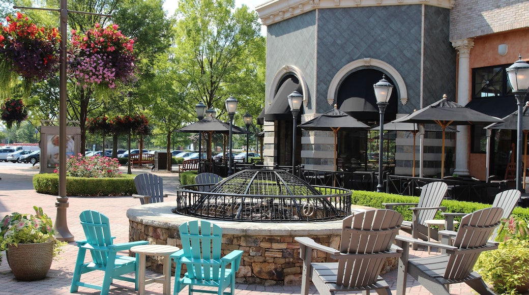 Cast stone fire pit with a protective cover in a public area, Short Pump Town Center, Virginia, USA