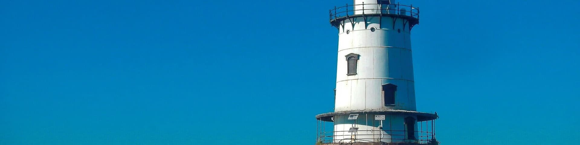 Guarding the entrance to the Providence River, the first lighthouse at Conimicut Point Shoal was established in 1868.The lighthouse is listed in the National Register of Historic Places.