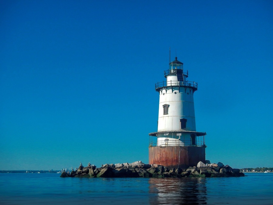 Guarding the entrance to the Providence River, the first lighthouse at Conimicut Point Shoal was established in 1868.The lighthouse is listed in the National Register of Historic Places.
