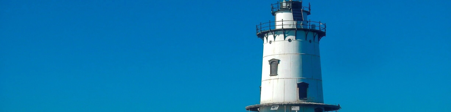 Guarding the entrance to the Providence River, the first lighthouse at Conimicut Point Shoal was established in 1868.The lighthouse is listed in the National Register of Historic Places.