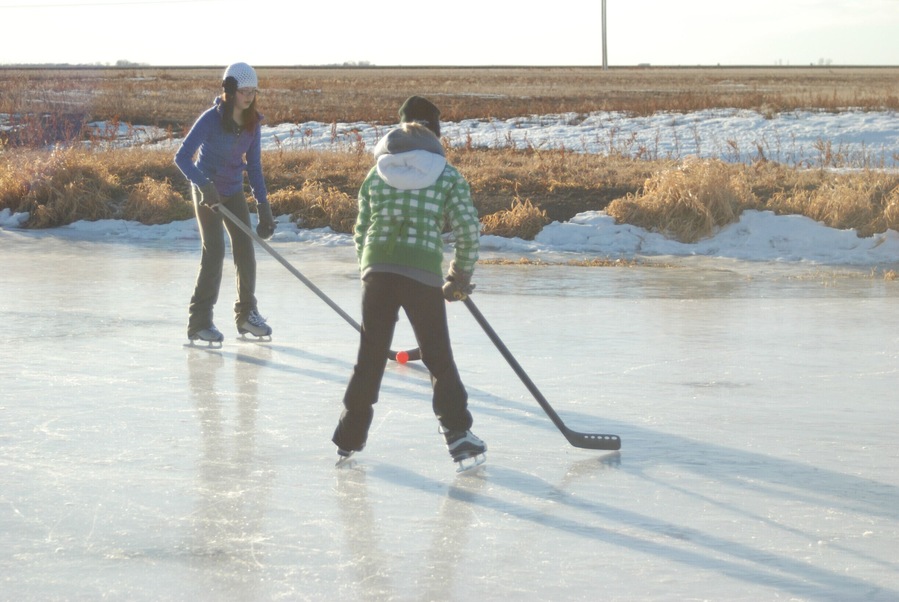 I'd be lieing if I told you Canadians don't play hockey... This is out on the dugout a few years back...I love Canada