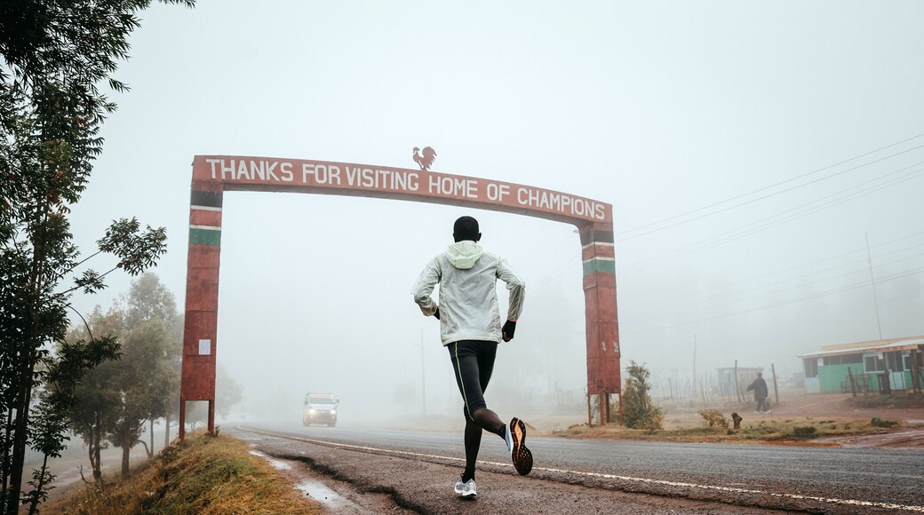 Runner with the inscription Thanks for visiting Iten, home of Champions, running training in Kenya. Marathon running, illustration photo