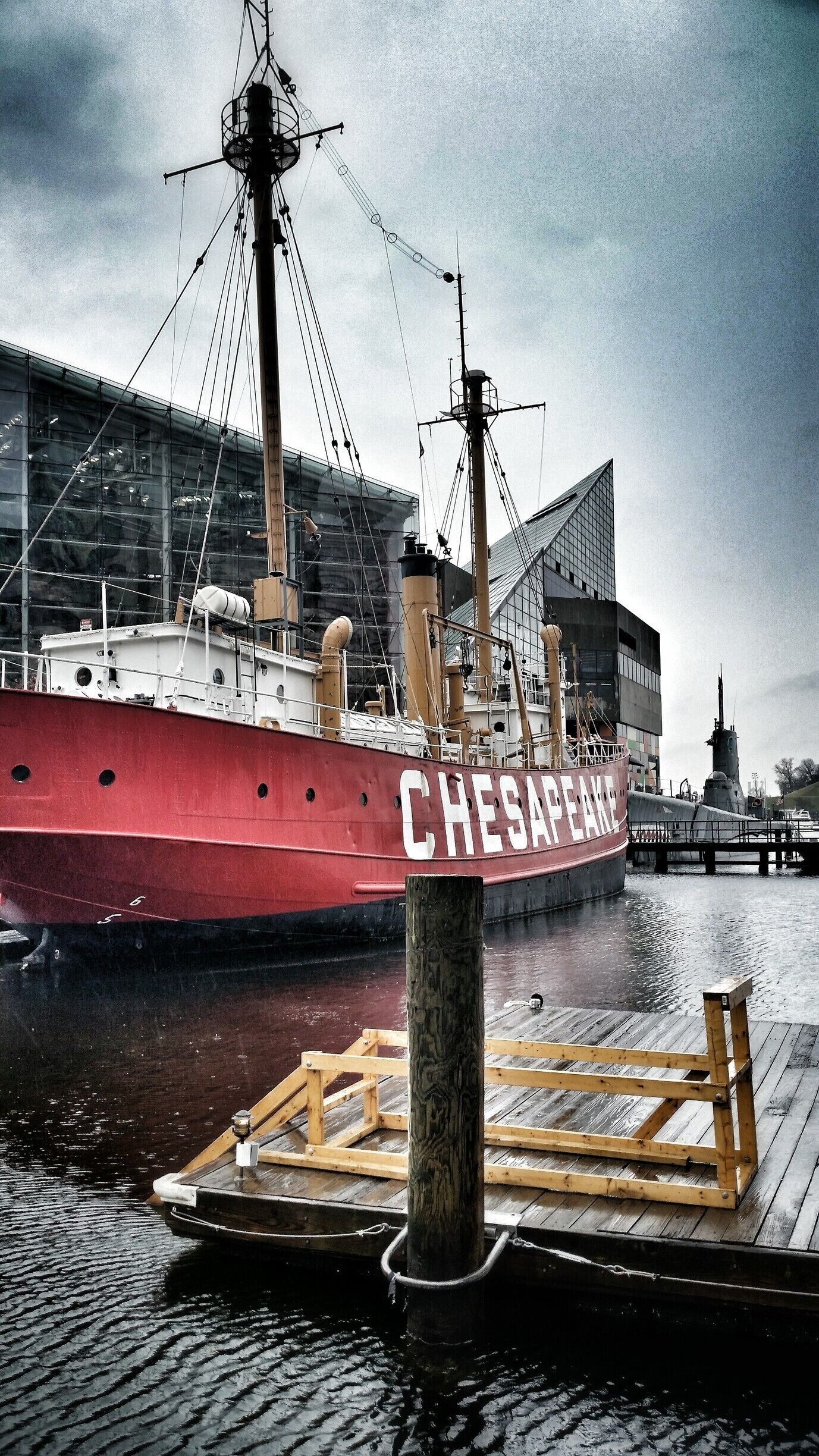 Walking along the harbor on a cold, rainy December morning. The USS Constallation wasn't in dock but the US Torsk was. The National Aquarium is in the background.