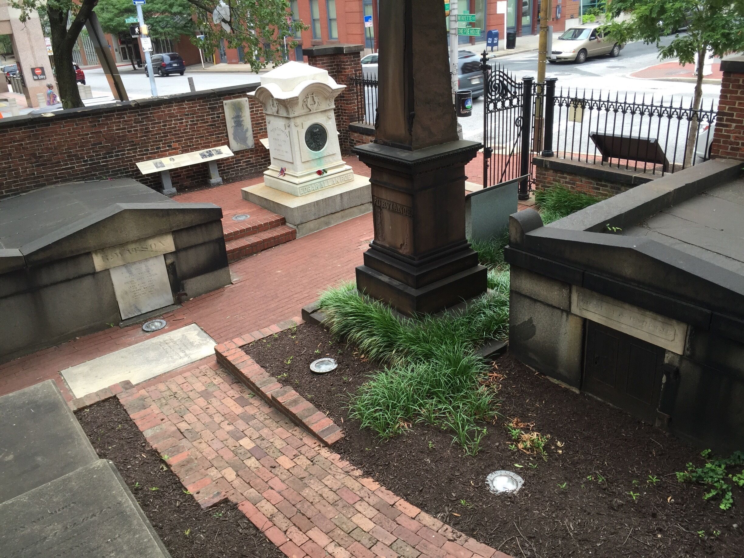 The grave site of Edgar Alan Poe rests in Westminster alongside a who's who of Baltimore. The wrought iron carriage gates (right) were added in the mid-1900s by a wealthy fan of the late author in order to protect the area and add to its charm. 