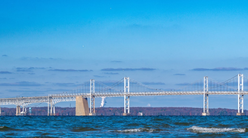 The Chesapeake Bay Bridge under a brilliant blue sky on a crisp autumn day.