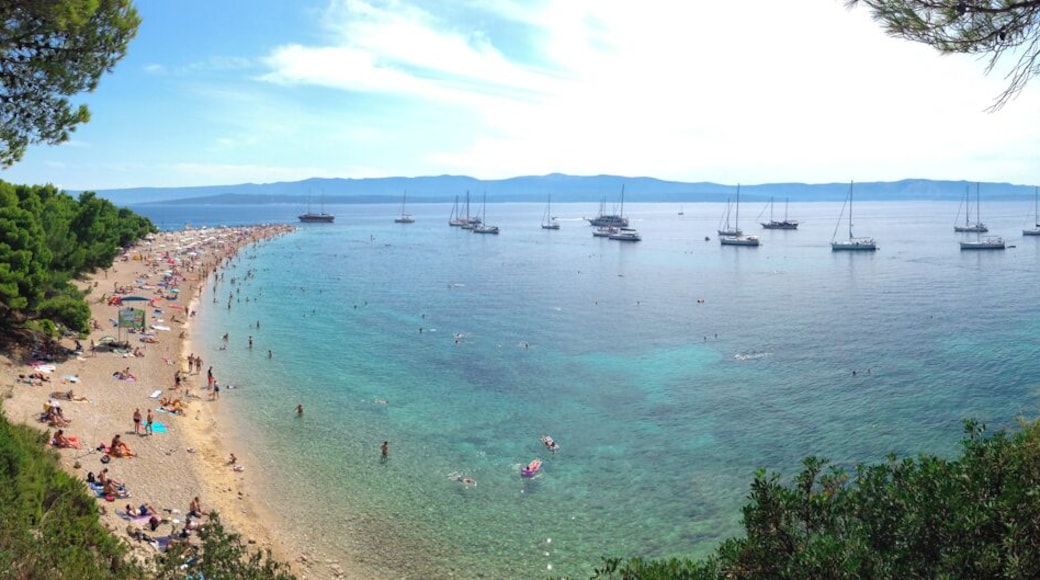Zlatni Rat near Bol, Croatia is one of the most uniquely shaped beaches I have ever encountered. The V-shaped white pebble beach backs up to a lovely pine grove, offering the perfect shade for those looking for some natural cover from the sun. The water is calm and crystal clear. The beach itself extend out about 630 meters, but the shape of the spit varies greatly depending on the currents, tide and wind. While it can be a bit crowded mid-day during the high season, if you head to Zlatni Rat first thing in the morning or late in the afternoon, you'll have the entire beach to yourself. #beach