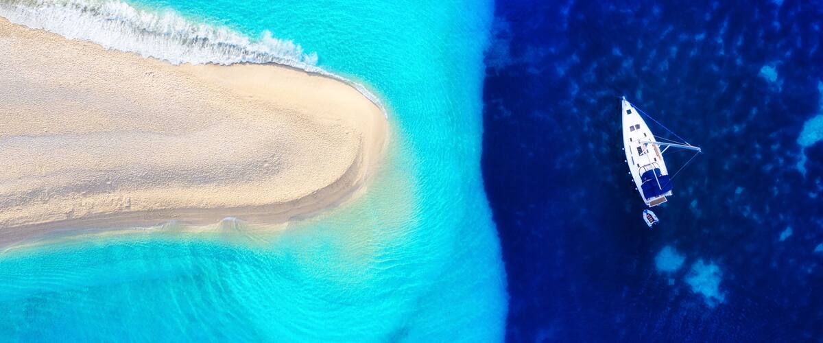 Croatia. Yachts at the sea surface. Aerial view of luxury floating boat on blue Adriatic sea at sunny day. Travel - image