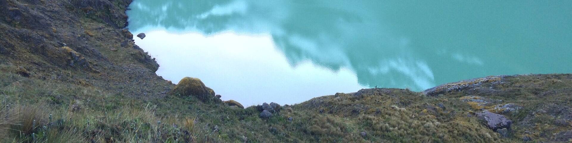 The Altar is an extinct volcano on the Western side of Sangay National Park in Ecuador, 170 km south of Quito. Altar was active about 2 million years ago and containsa boiler open towards the West, containing a Lake of laguna yellow name.
http://www.cotopaxi-travel.com/ecuador-trekking-altar-volcano.php