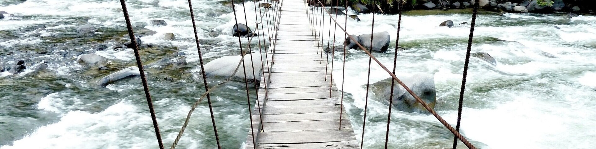 Bridge across the Intag River in Ecuador. I was staying at a small lodge near this and I crossed the river here to follow a trail into the jungle.