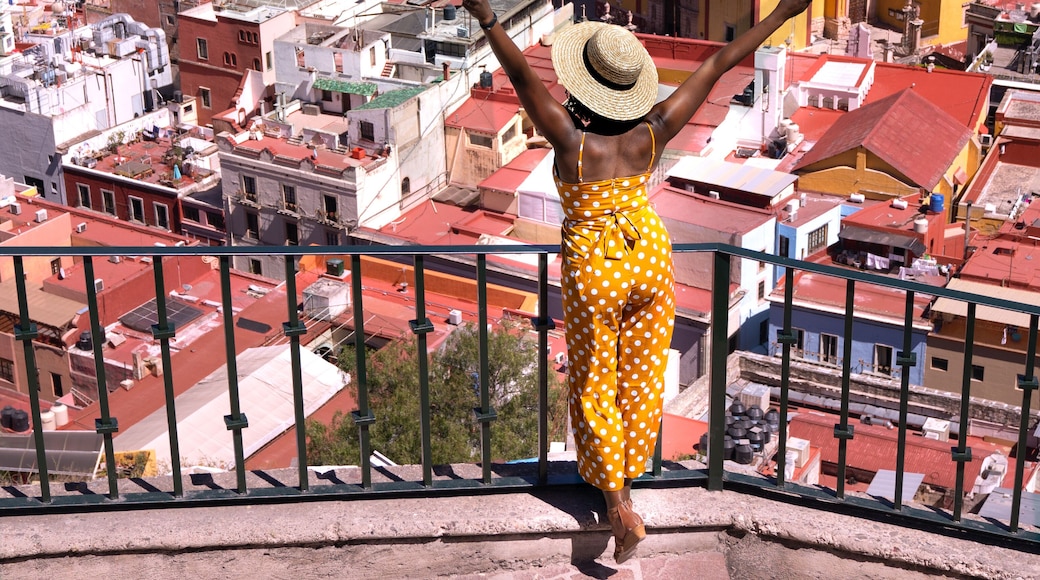 The walk up to Pipila viewpoint will take your breath away because it's steep but it's well worth it. Go before noon when the sun makes the buildings shine!