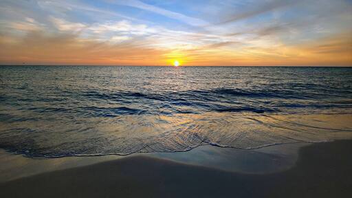The day comes to a close over the Gulf of Mexico.
Bean Point Beach is at the Northwest end of Anna Maria Island. A nice wide beach with fine white sand. A little more secluded than some of the other beaches nearby.