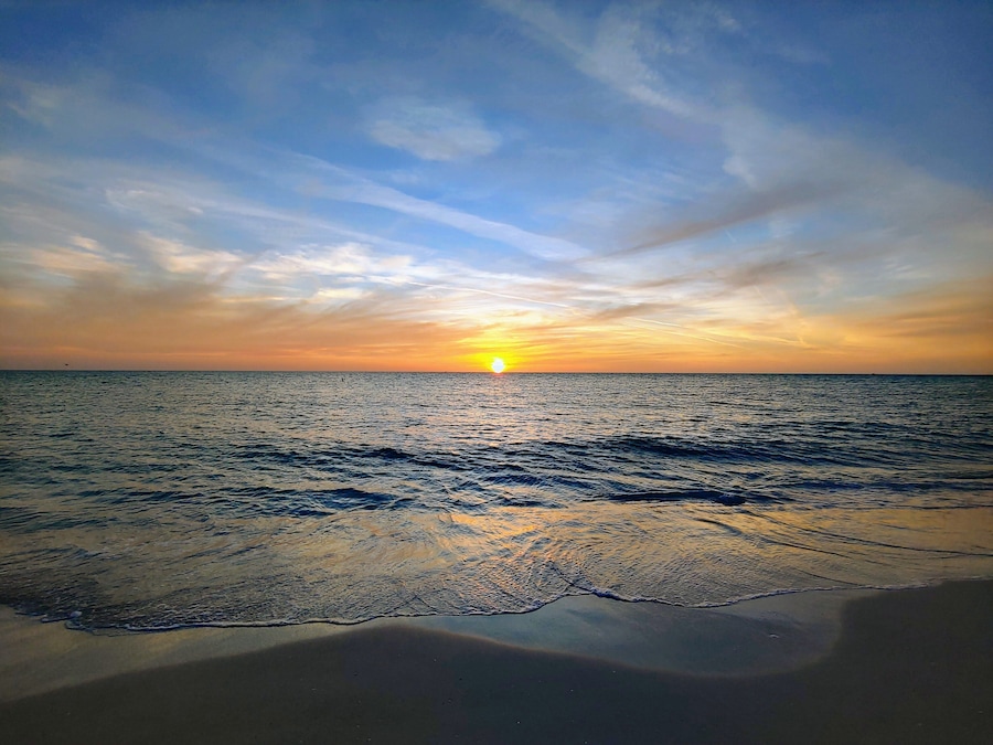 The day comes to a close over the Gulf of Mexico. 
Bean Point Beach is at the Northwest end of Anna Maria Island. A nice wide beach with fine white sand. A little more secluded than some of the other beaches nearby.