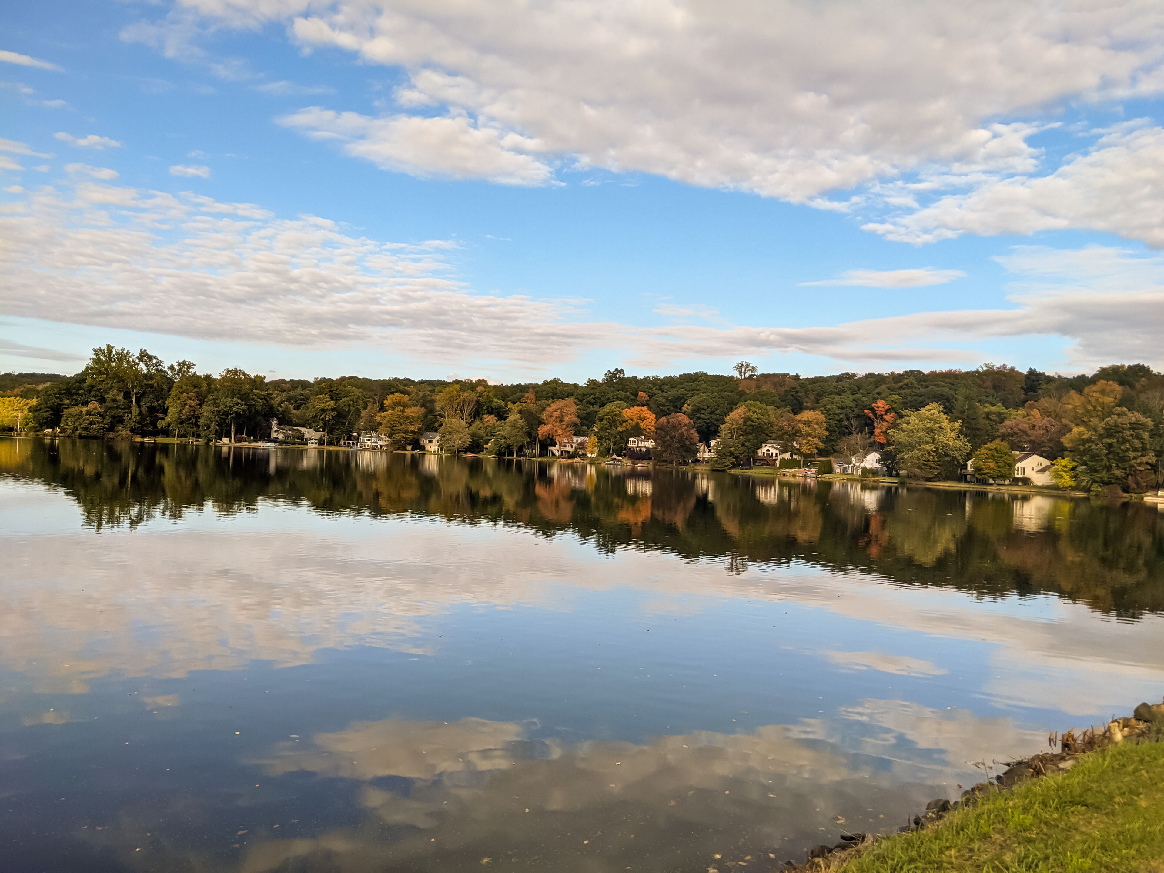 Packanack lake landscape in Wayne with beautiful reflection from the trees and clouds 