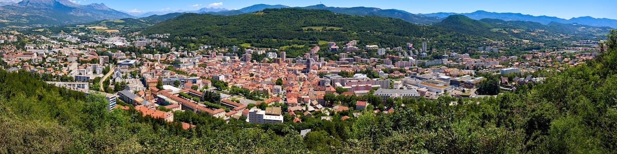 Elevated panoramic view of the city of Gap in the Hautes-Alpes in Summer. Southern French Alps, France