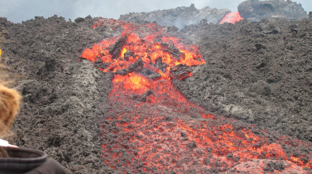 20 feet from flowing lava just may be the top experience of my life. If you are in Guatemala and whether you consider yourself a hiker or not, climbing Pacaya is a must. I would even consider going multiple times because the mountain changes on a daily basis (even second by second). Where you hike one day may be covered by lava flows then next day and you'd have to take a completely different route. Try looking in a crater if allowable on that day,