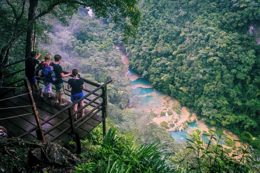 Admiring the Cahabon river and its natural pools from the top of the mountains.