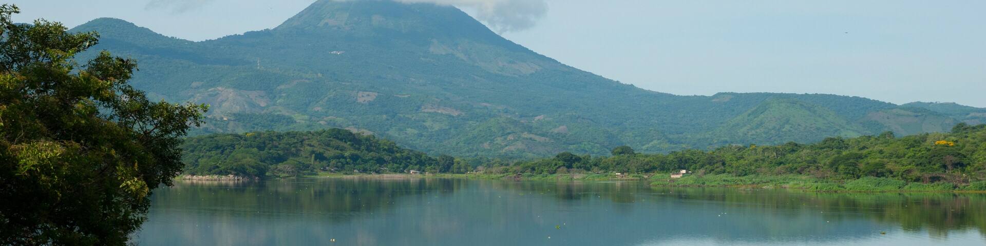 Forest lagoon Atescatempa, mountains and volcano Las Viboras in Guatemala. Jutiapa.
