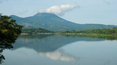 Forest lagoon Atescatempa, mountains and volcano Las Viboras in Guatemala. Jutiapa.