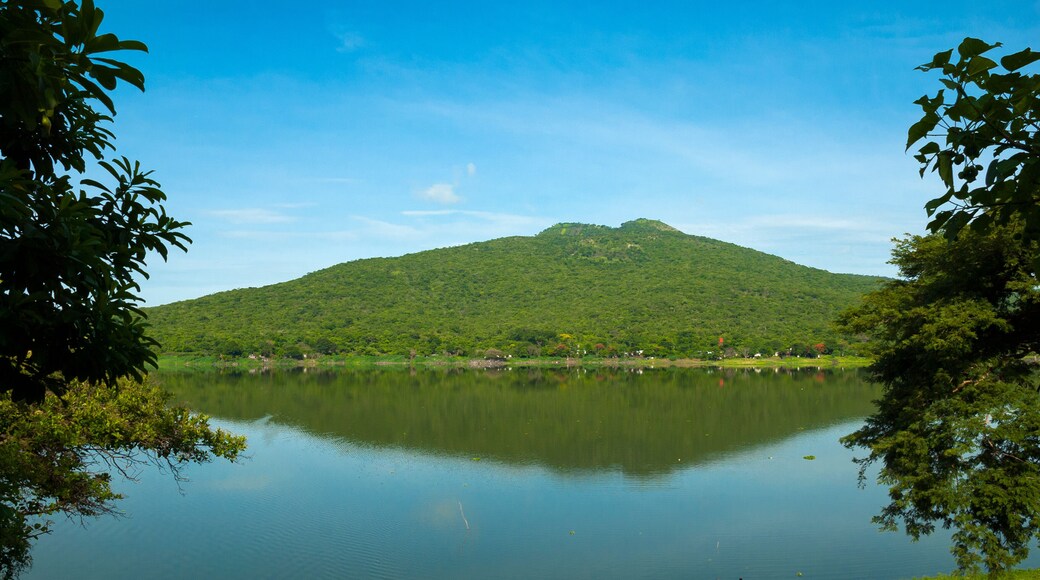 Forest lagoon Atescatempa, mountains and volcano Las Viboras in Guatemala. Jutiapa.