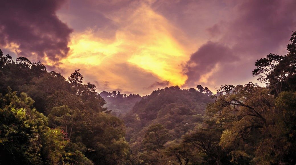 Taking a cold shower on a river after a long day of hiking through the guatemalan countryside.