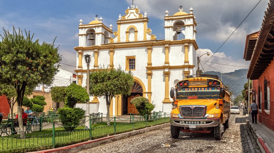 Chicken bus in front of Ermita de Santa Lucia, Antigua Guatemala, Guatemala