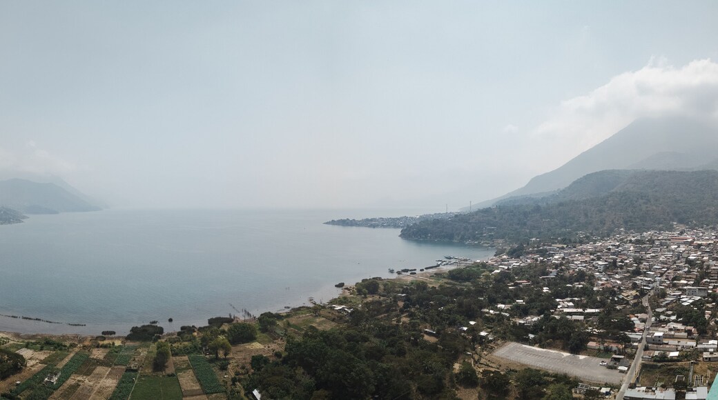 Panorama city view of San juan la laguna on lake atitlan on a smoky day