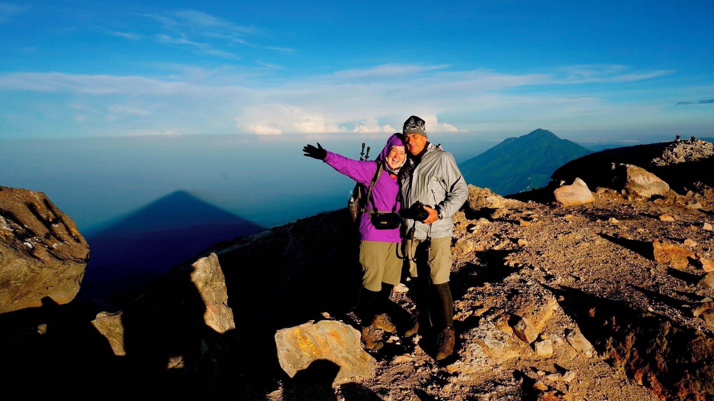 I was at the highest point of Central America and had survived everything it had thrown at me. Looking out to see the view, resplendent volcanoes that surround Tajumulco feel like they are bowing to you, a conqueror of the toughest amongst them.

Looking out from where I had come I could see clouds beneath, it was a breathtaking sight. The clouds formed a whirlpool in the sky, with the obligatory patch of sky in the middle. 

On the other side, is the Pacific Ocean along with land parceled into different shapes and colours. From the sides the view was filled with clouds of various sizes with peaks of other volcanoes protruding through them, standing tall and proud.

#hiking

http://worldwideadventurers.com/volcano-hiking-tajumulco-in-guatemala/
