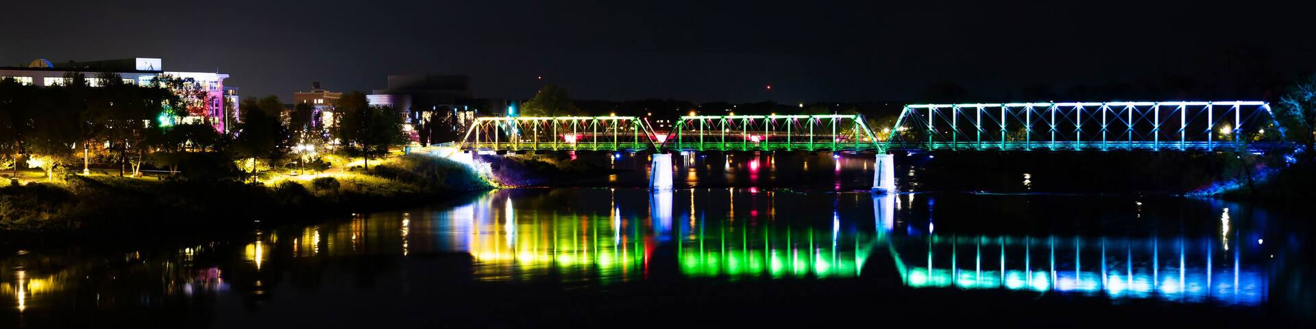 River Lights Bridge Illuminated at Night in Eau Claire