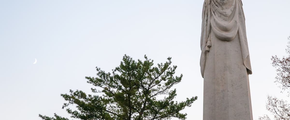 A statue of an eagle with outstretched wings.