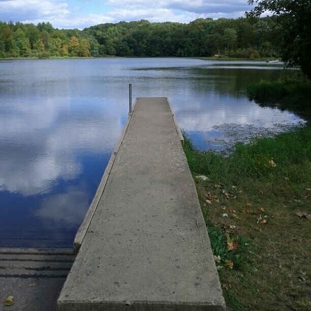The boat launch out into Hargus Lake within A.W. Marion State Park. You can rent kayaks, paddle boats, rowboats or canoes to explore the lake and its few tiny islands.