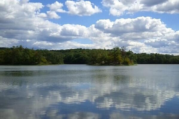The clouds reflecting off of Hargus Lake.