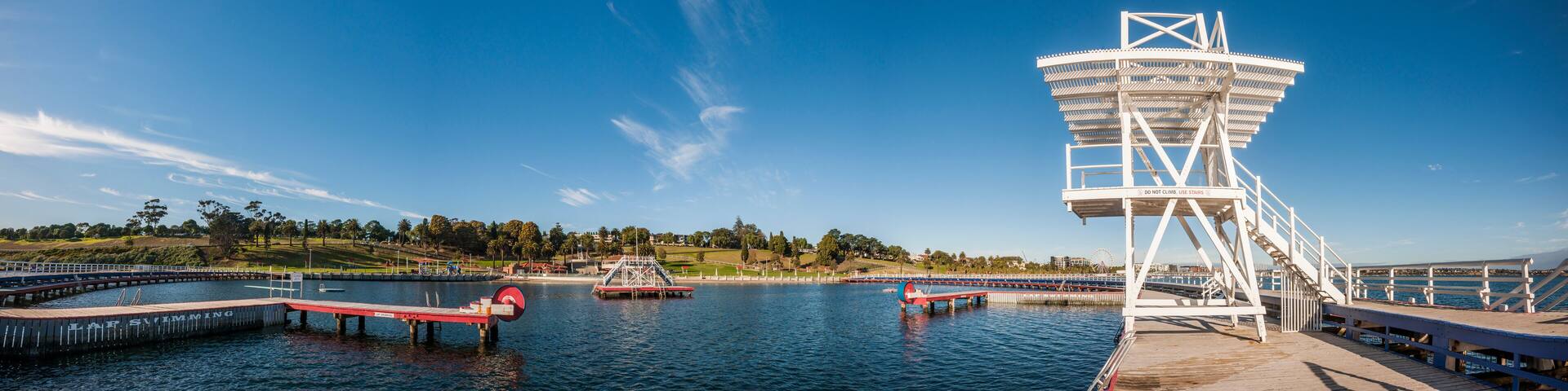 A water tower, a dock, and a Ferris wheel.