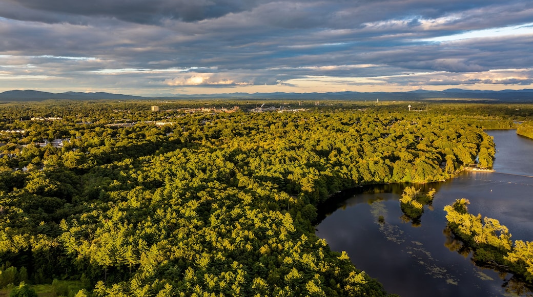 Queensbury, NY, USA - August 27, 2025: Late afternoon aerial view over the Queensbury, NY, and the Hudson River, near the southern boundary of the Adirondack Park of of Interstate 87.