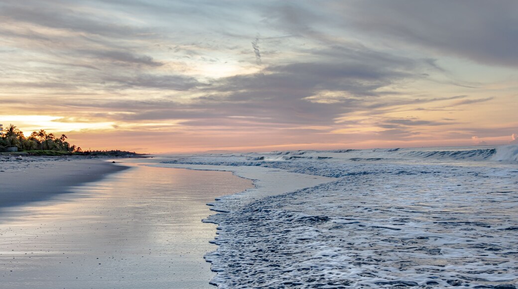 Majestic beach sunrise seascape at Costa del Sol, El Salvador.