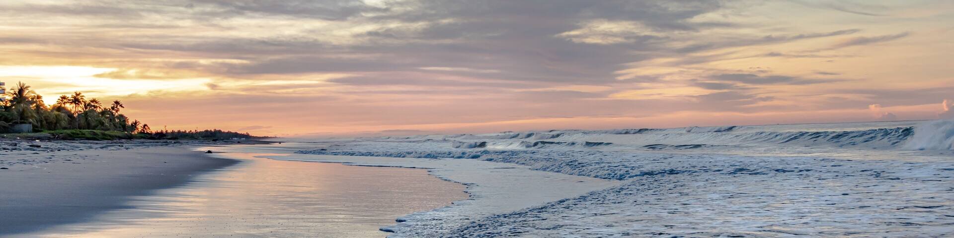 Majestic beach sunrise seascape at Costa del Sol, El Salvador.