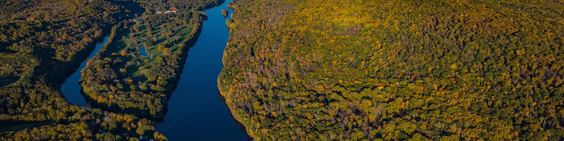 10/14/22 Aerial View of Delaware River flowing through Delaware River Gap in autumn, Pennsylvania