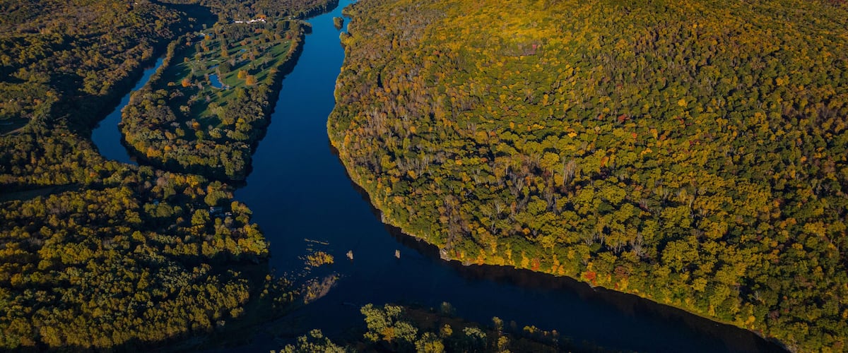 10/14/22 Aerial View of Delaware River flowing through Delaware River Gap in autumn, Pennsylvania