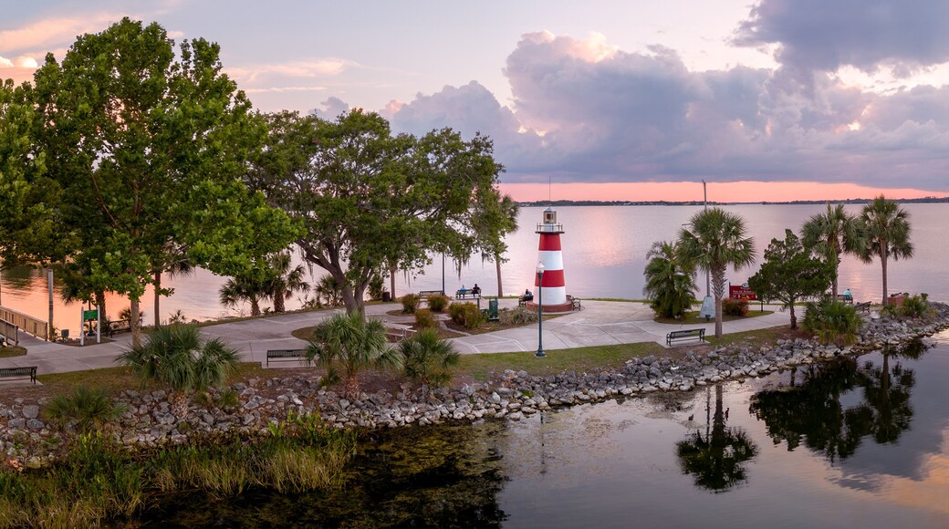 Mount Dora Lighthouse on Lake Dora at sunset with dramatic clouds. Florida, USA. May 18, 2023.