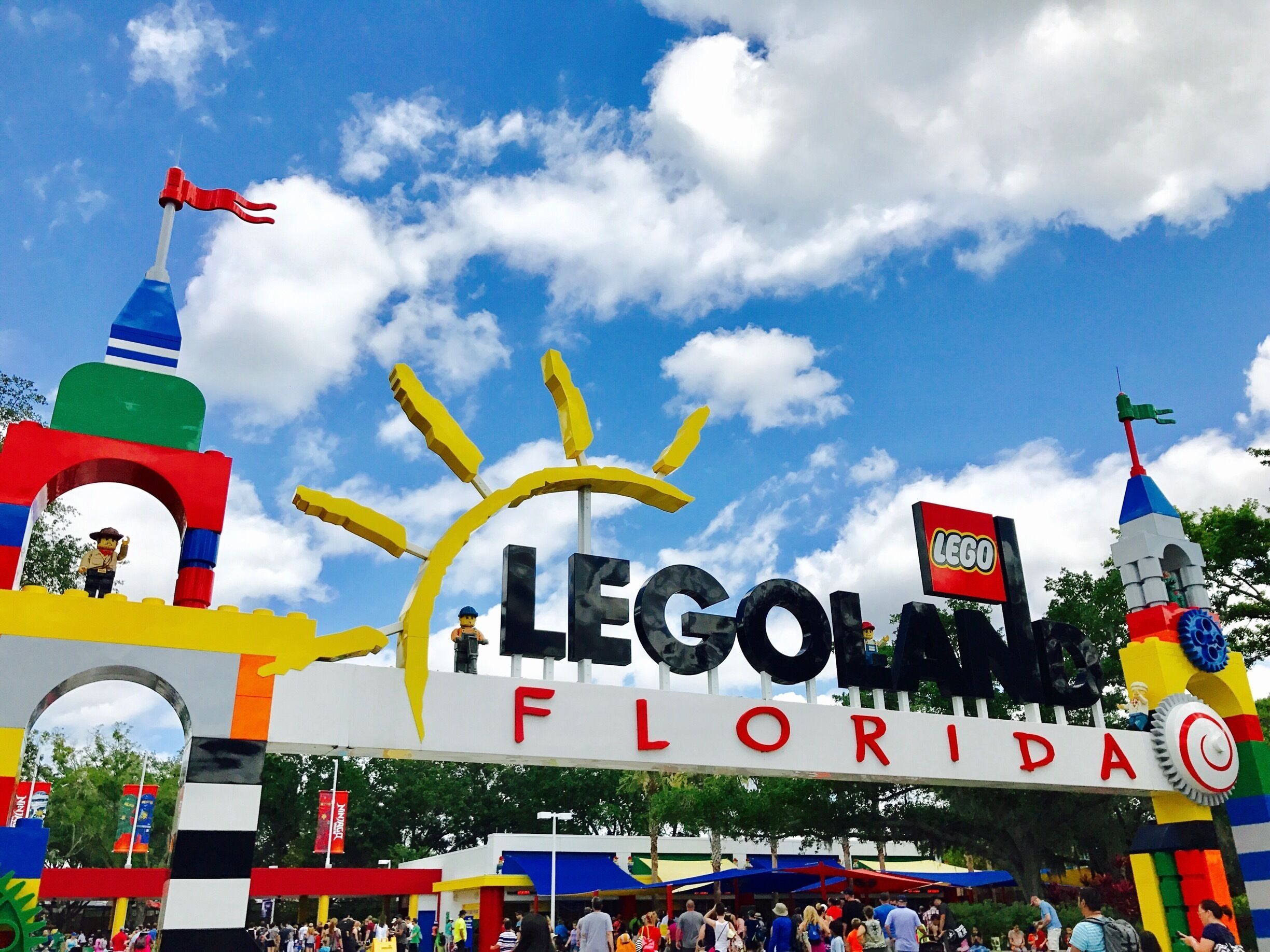 A LEGO-themed entrance with a sun design and the words "LEGO FLORIDA" prominently displayed.