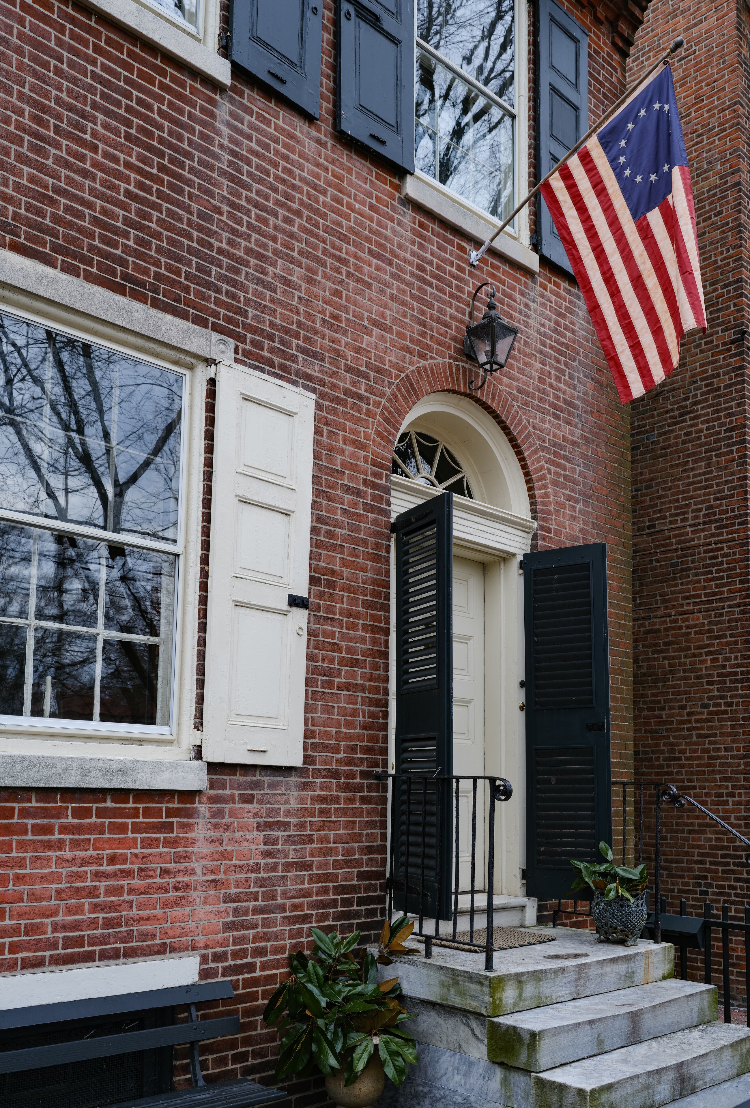 Colonial Flag on an old colonial home in the old town of New Castle Delaware