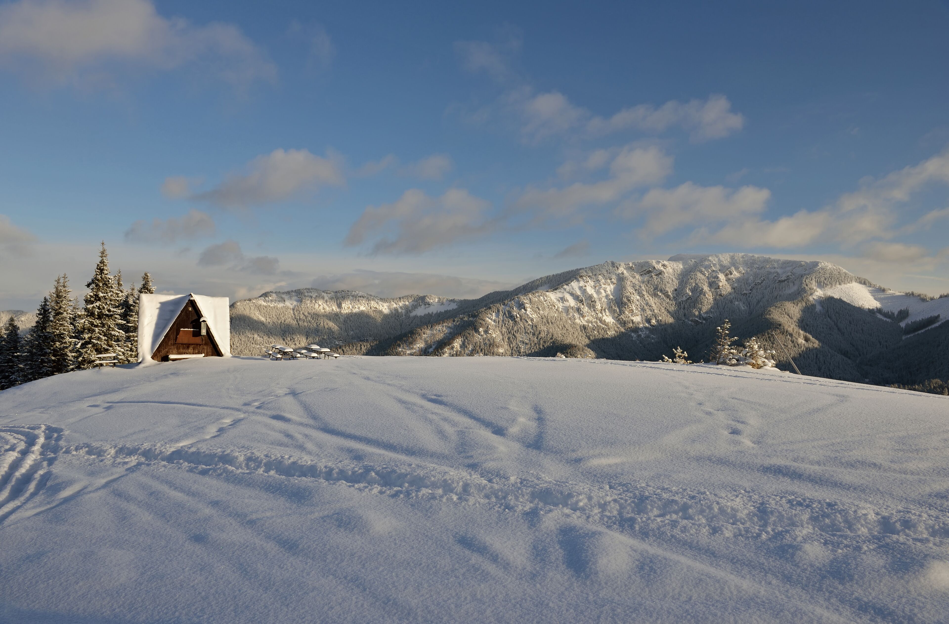 JASNA, SLOVAKIA - It is the largest ski resort in Slovakia with 49 km of pistes in Jasna, Slovakia. Snow, sunny winter day, closed restaurant