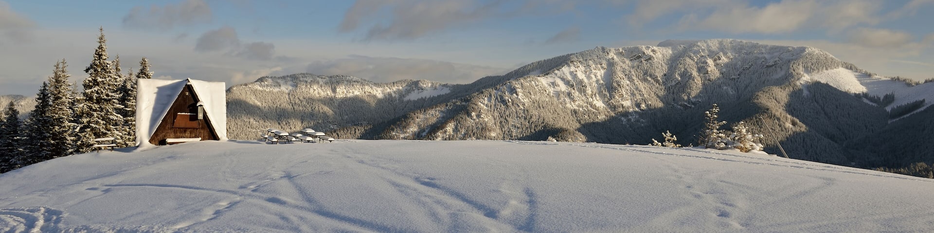 JASNA, SLOVAKIA - It is the largest ski resort in Slovakia with 49 km of pistes in Jasna, Slovakia. Snow, sunny winter day, closed restaurant