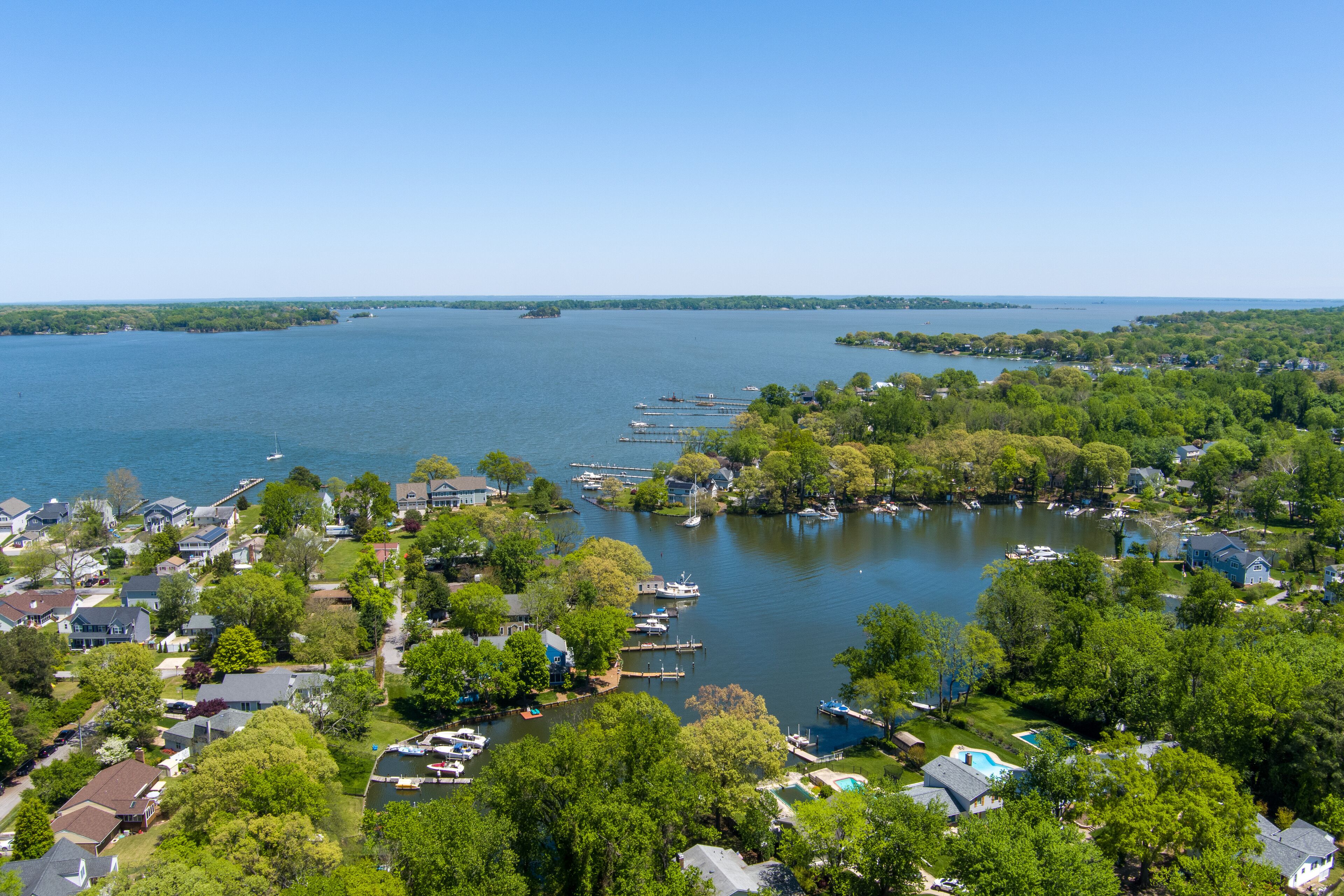 Aerial view of the Magothy River, Spriggs Pond and the surrounding area in Arnold, Anne Arundel County, Maryland. 