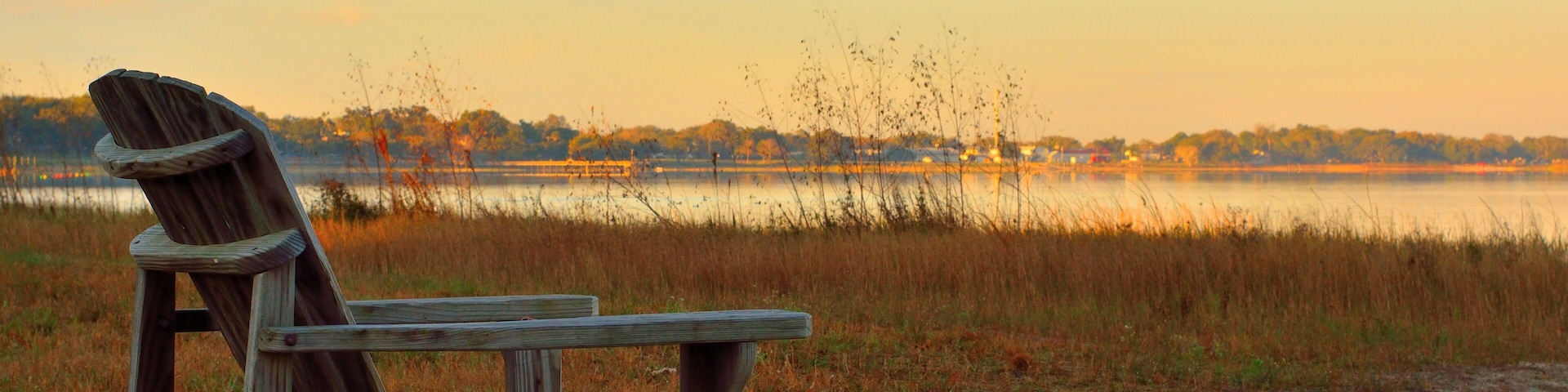 Adirondack Chair Looking out to Lake Minneola, Clermont, Florida; Shutterstock ID 772282999; purchase_order: SP-1269 HA 2018 Batch 1; Order: ; client: ; other: