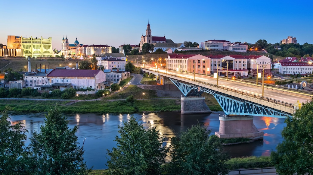 Cityscape of Grodno at dusk with bridge over Neman river, Belarus