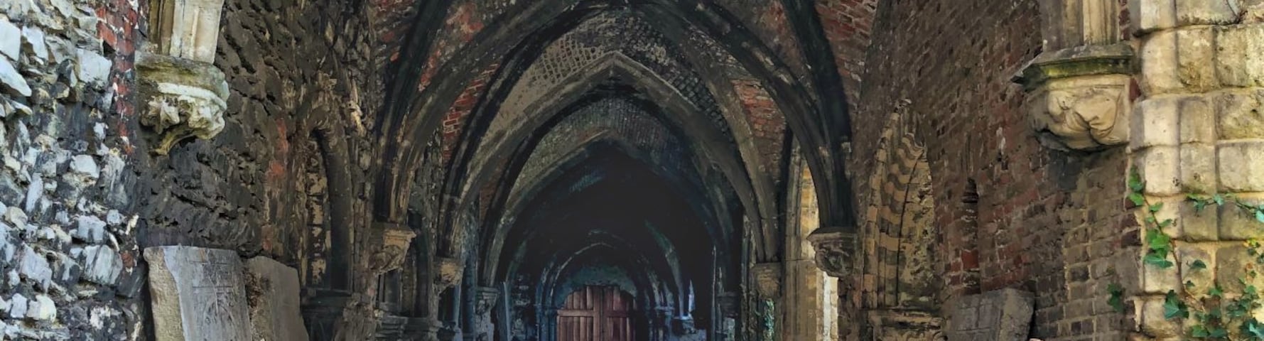 This was my favourite place to visit in Ghent. I could have taken pictures all day in the ruin of St. Bavo's Abbey. An quiet oasis in the city, we were the only people there. So quiet and serene and many courtyards to explore including a medieval church. 
Founded in the 7th century, the former abbey is now ruins echoing the history that took place here. The oldest wall in Ghent stands here.
The original Romanesque church that was destroyed is marked out by lovely hedges so you can see where it once stood as the five-metre-high shrubbery columns mark out the foundations.
Entry was free.